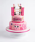 Pastel de luchadoras Girl Power de dos pisos en fondant rosa con ring, máscara y nombre personalizado, L'Autrichienne CDMX