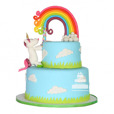 Pastel decorado de unicornio acompañado de un delicioso arcoíris,